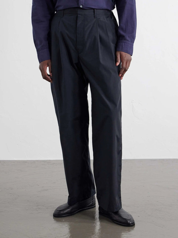 Wide-Leg Cotton-Blend Pleated Trousers