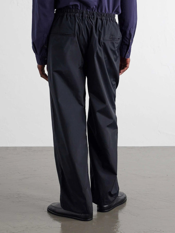 Wide-Leg Cotton-Blend Pleated Trousers